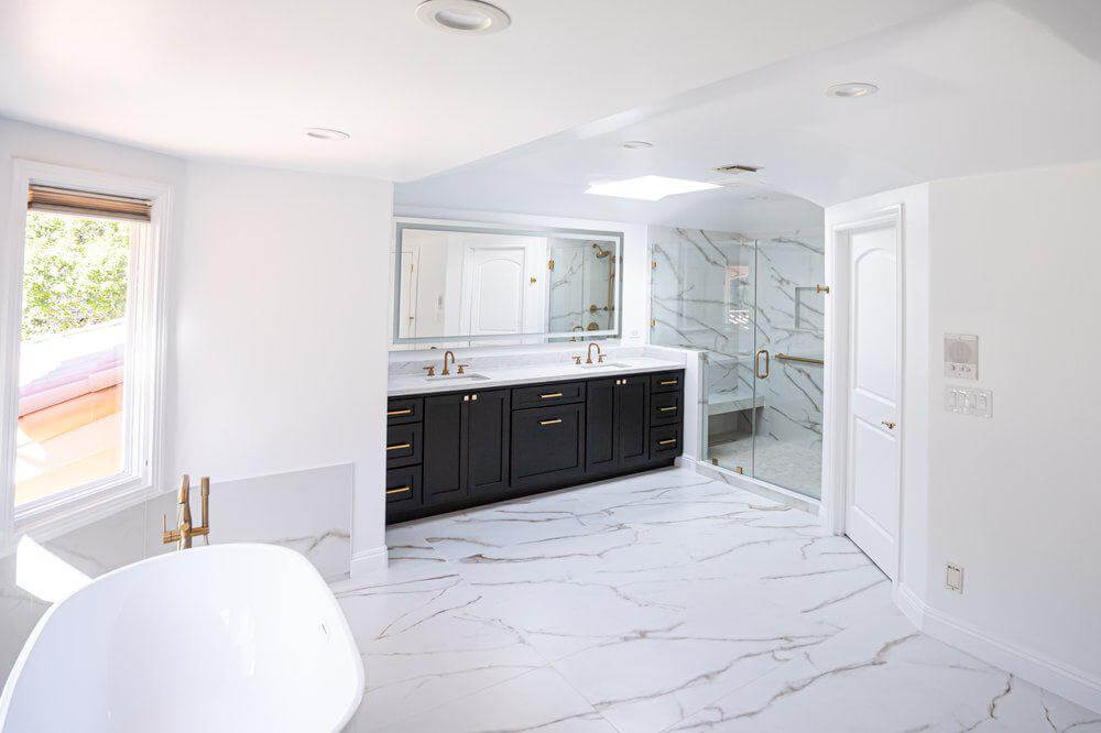 Bathroom shower and tile by Dreamliner Construction