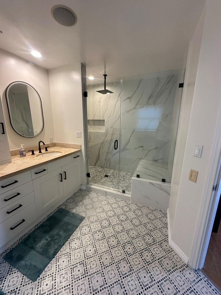 Bathroom shower and tile by Dreamliner Construction