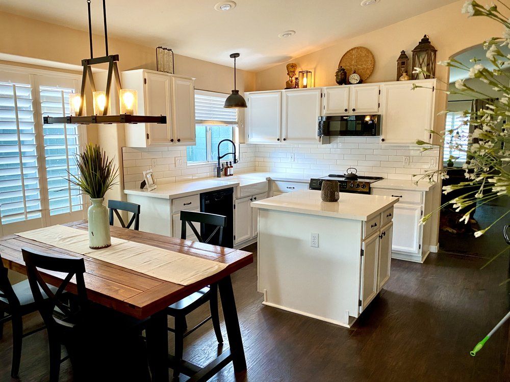 Open kitchen and dining remodeled by Dreamliner Construction