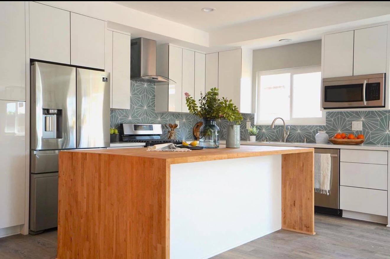 Kitchen island and cabinetry by Dreamliner Construction